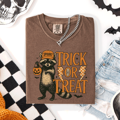 Trick or Treat Raccoon Halloween Mischief With Skeletons Ghosts Cats And Pumpkins Comfort Colors Tee