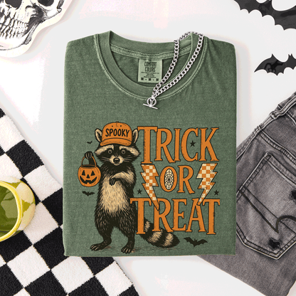 Trick or Treat Raccoon Halloween Mischief With Skeletons Ghosts Cats And Pumpkins Comfort Colors Tee